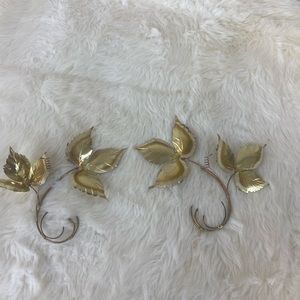 A pair of vintage home interior wall art